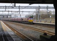 DB 66037 approaches with Longannet - Hunterston High Level empties.<br><br>[Bill Roberton 18/03/2016]