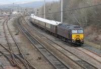 With the lifting of the West Coast Railways suspension a full programme of trains has recommenced, including a <I>Statesman Rail</I> tour from Euston to Fort William on 2nd April 2016. The return leg on 4th April is seen leaving the Up Loop at Carnforth behind 57316. Out of sight behind the Pullman stock is stablemate 57601. <br><br>[Mark Bartlett 04/04/2016]