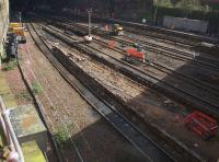 View of what remains of the north end of platforms 1-6 as the work to modify the track layout proceeds. The spray painted lines are markers for drainage work, and a line of shuttering crosses the centre of the picture diagonally down the right side of platform 1.  <br><br>[Colin McDonald 07/04/2016]