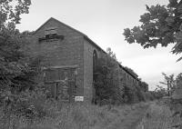 Believed to be the former locomotive shed at Michael Colliery, East Wemyss. The access line to the pit sidings ran to the right.<br><br>[Bill Roberton //1992]