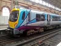 Parked for display, a class 185 unit at Manchester Piccadilly with the new TransPennine livery on the launch day of the new franchise.<br><br>[Hugh McLellan 01/04/2016]