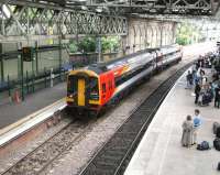 South West Trains liveried 158786 at the east end of Waverley on 5 July 2007. The train is standing alongside the recently completed 'Balmoral' through platform. <br><br>[John Furnevel 05/07/2007]