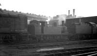 The shed yard at Heaton in the early part of 1961. Centre stage is resident J72 0-6-0T 68713. Built at Darlington in 1920 the locomotive was withdrawn from here in October 1961 and cut up at its birthplace the following April. <br><br>[K A Gray //1961]