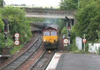 EWS 66212 with Longannet - Hunterston coal empties coming off the Dunfermline line at Inverkeithing Central Junction on an overcast morning in June 2006. View north from Inverkeithing station.<br><br>[John Furnevel 19/06/2006]