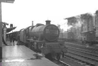 Calling at Carlisle platform 1 on Saturday 17 August 1963 is the 1S46 9.15am Liverpool Exchange - Glasgow Central. Locomotive in charge throughout is Bank Hall shed's Jubilee 45698 <I>Mars</I>.<br><br>[K A Gray 17/08/1963]