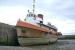 Former Clyde Shipping tug/tender 'Flying Buzzard' (perhaps the last steam tug built for use on the Clyde), built by Fergusons at Port Glasgow, 1951, ingloriously run down and sunk by her tow (a tanker) in the river off Dumbarton, 1952. Raised and repaired, she carried on working on the Clyde then at Dundee thereafter. She arrived at Maryport in Cumbria during 1983 and was part of the maritime museum there for 20 years, but when that closed she was purchased by Julie Jessop and Mike Nelder, who had visions of sailing her to Vancouver (why there I never found out!) and set about converting her for that voyage, bearing in mind her boilers had been removed so 'new' main engine and gearbox had to be fitted. Vessel photographed in the outer harbour at Maryport, 01 August, 2007, having been moved out from the wet basin to allow yours truly to visually survey the hull (which was in excellent overall condition due to all those years in almost fresh water in the Clyde and Tay estuaries). She eventually sailed from Maryport in December, 2008 and was seen, again by yours truly, in Trinidad, 15 November, 2009, the extension of the voyage to Vancouver having been temporarily put on hold. As far as is known, at the start of 2016 she was still in the Caribbean, having never gone any further (we can only surmise that Mike and Julie liked the Caribbean and decided to stay – why ever not!).<br><br>[Robert Blane 01/08/2007]