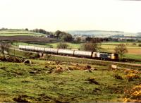 47.633 leads 6 coaches on an Inverness to Aberdeen working in May 1987. This was my last holiday on Deeside before my parents moved South. [see image 26861] for an opposed working.<br><br>[Ken Strachan /05/1987]