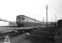 A BR Swindon built DMU passing Cowlairs West Junction on 2 July 1957 with a Glasgow Queen Street - Edinburgh Waverley service. <br><br>[G H Robin collection by courtesy of the Mitchell Library, Glasgow 02/07/1957]