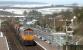 GB Railfreight 66737 <I>Lesia</I> takes 6M49 the diverted Mossend to Carlisle engineers wagonload through New Cumnock on 18 February 2016.<br><br>[Ken Browne 18/02/2016]