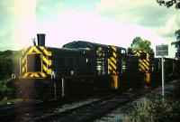 03.151 and 03.152 (coupled in multiple via a cat's cradle of cables - there were a lot of separate cables, perhaps 15 or more, strung loosely between the backs of the cabs) plus a third 03 (not in multiple) heading a coal train down the BPGV line from Cwm Mawr.<br><br>
The locomotives are seen approaching the level crossing at Cwm Mawr, just south of the terminus.<br><br>
These were taken in 1982 the year before the BPGV line was re-routed to avoid flooding and permit the use of 08s instead of 03s.<br><br>[Andrew Saunders //1982]