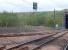 Track level view of the then recently completed turnout at Newcraighall North Junction built in conjunction with the re-opening of stations at Newcraighall (off the picture to the right just beyond the A1 overbridge) and Brunstane. The siding rises quite steeply to a hump [see image 54492]. This was later rebuilt to a better standard and then rebuilt again on a different alignment when it became the junction for the Borders Railway.<br><br>[Charlie Niven 25/04/2002]