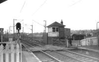 A quiet moment between trains and the signalman has a chat with the clerk from the booking office at Cardross in March 1970.<br><br>[John McIntyre /03/1970]