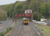 156448 departs Hexham for Nunthorpe, via Newcastle and Hartlepool, on 2nd May 2016. Trains from Newcastle that terminate at Hexham run <I>wrong line</I> on departure and the Sprinter will only cross over after passing under the signal box. <br><br>[Mark Bartlett 02/05/2016]