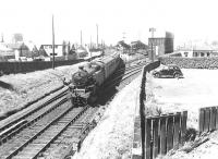 Fairburn tank 42196 passing Hawkhill Junction with a Glasgow - Ayr train on a sunny July day in 1959. Ayr locomotive shed stands in the background.<br><br>[G H Robin collection by courtesy of the Mitchell Library, Glasgow 04/07/1959]