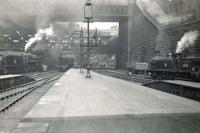 Busy scene at Glasgow Queen Street on 23 May 1957. Over on the left Standard class 5 73105 is about to take out a train, in the centre A3 60089 <I>Felstead</I> is approaching the platforms from the tunnel, while over on the right station pilot N15 69126 is standing by for its next task.<br><br>[G H Robin collection by courtesy of the Mitchell Library, Glasgow 23/05/1957]