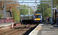 The 1719 Glasgow Central to Aberdeen made up of a combination of a 170 and a 158 set just after passing Coatbridge Jn approaching Coatbridge Central.  09/05/16<br><br>[Alastair McLellan 09/05/2016]