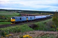 For only the second time, two Class 73's have hauled the Caledonian Sleeper to Inverness. 73966 and 73967 are pictured leaving Culloden Viaduct on the return working to Edinburgh on 21 May 2016. There the sleeper coaches will those from Fort William and Aberdeen before going on to London Euston.<br><br>[John Gray 21/05/2016]
