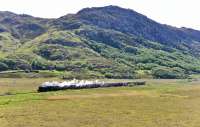 Black 5 No.44871 races along the straight at Torran Nam Meirleach (Little Knoll of the Thieves), south of Morar, with the westbound Jacobite.<br><br>[John Gray 25/05/2016]
