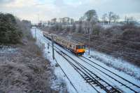 318259 (GW) north of Kilwinning with the 0945 Glasgow Central - Largs.<br><br>[Colin Howat 28/12/2009]