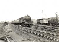 A Helensburgh Central - Bridgeton Central train passing the site of Yorkhill station (closed 1921) on 5 August 1957. Locomotive in charge is V1 2-6-2T 67623. [Ref query 19289]  <br><br>[G H Robin collection by courtesy of the Mitchell Library, Glasgow 05/08/1957]