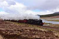 Black 5 No.44871 is pictured between Achanalt and Achnasheen with the GB IX trip to Kyle of Lochalsh.The River Bran in the background.<br><br>[John Gray /05/2016]