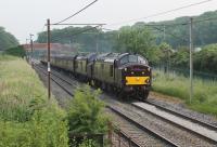 On 9th June 2016 the <I>Scarborough Spa Express</I> ran via Preston and the East Lancashire/Copy Pit line rather than via Skipton. As on the previous week it was also powered by two EE Type 3s instead of the usual Brush Type 4. WCRC 37668 and 37685 head south at Woodacre with the seven coach train that was steam hauled by 8F 48151 between York and Scarborough. <br><br>[Mark Bartlett 09/06/2016]