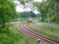 ScotRail 158730 southbound between Newtongrange and Gorebridge about to enter the wooded area leading into the Gore Glen at Arniston on 19 June 2016. The train is the 0911 Edinburgh Waverley - Tweedbank.<br><br>[John Furnevel 19/06/2016]