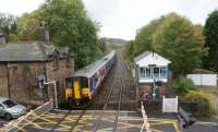A Buxton to Manchester service has just called at Furness Vale station behind the photographer on 19 October 2010. This service comprised of 3 sets, a mixture of Class 156 and 150s, in order to get one of them back to Manchester for maintenance.<br><br>[John McIntyre 19/10/2010]
