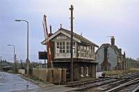 The former station at Claydon on the Great Eastern main line north of Ipswich as it appeared on 2nd January 1978. It had closed to passengers in 1963 and was notable for its ornate station building. Unfortunately, the building was demolished in 1992, the signal box having been abolished six years earlier.<br><br>[Mark Dufton 02/01/1978]