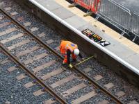 Checking the measurements while fitting datum plates at the rebuilt platform 1 at Queen Street High Level in late July 2016.  <br><br>[Colin McDonald 21/07/2016]