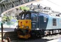 Sleeper locomotive 73970 seems to have struggled to find a bit of shade in the bay at the east end of Waverley on 19 July 2016, the hottest day of the year so far.<br><br>[John Furnevel 19/07/2016]