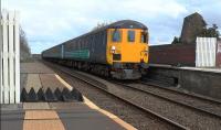 DBSO 9707 leads 37423 into Wigton on 2C34 a Carlisle to Barrow loco hauled service<br><br>[Ken Browne 09/04/2016]