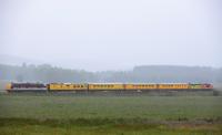 In heavy rain,Intercity liveried 37254 leads the test train for<br>
Inverness over the moor at Moy with Colas Railfreight liveried 37175<br>
bringing up the rear.<br><br>[John Gray 09/07/2016]