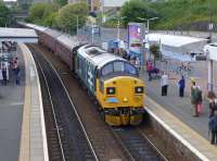 The Scottish 37 Group's 37025 enters Inverkeithing with an excursion<br>
from Linlithgow to Inverness, its first outing on the main line with a<br>
passenger train since overhaul.<br><br>[Bill Roberton 16/07/2016]