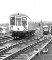 A 2-car DMU at Galashiels with a Carlisle - Edinburgh train on 2 July 1968 passes D365 held in the loop with a down pick-up freight.<br><br>[Dougie Squance (Courtesy Bruce McCartney) 02/07/1968]