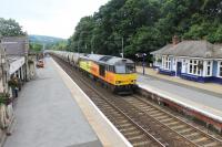 Colas 60087 powers through Pitlochry on 19th July 2016 hauling cement tanks from Oxwellmains to Inverness. <br><br>[Mark Bartlett 19/07/2016]