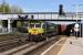 Freightliner 66594 with a train of containers heading south on the centre road through Eastleigh station on 6 May 2016, bound for Southampton docks.<br><br>[Peter Todd 05/05/2016]