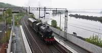 K1 62005 passes Bowling basin en route from Grosmont to Fort William in heavy rain.<br><br>[Ewan Crawford 17/05/2016]