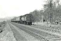 Stanier 3P 2-6-2T 40200 runs along the north bank of the River Clyde near Bowling on 12 April 1958 at the head of a Dumbarton Central - Rutherglen train.  <br><br>[G H Robin collection by courtesy of the Mitchell Library, Glasgow 12/04/1958]