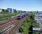 An Glasgow-bound service wisely avoids the Tay Bridge lines (in the foreground) on 31/05/2016. Cranes in the background promise big changes to the station and Riverside area, but you tell me.<br><br>[David Panton 31/05/2016]