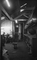 The workshop at the rear of Backworth NCB shed. The austerity 0-6-0ST had a new set of tyres but was condemned before returning to service.<br><br>[Bill Roberton //1975]