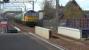 Colas Railfreight class 60 no. 60026 approaches Prestwick, after run round in Ayr station, with loaded aviation fuel tanks bound for BP Prestwick air terminal.<br><br>[Ken Browne 26/04/2016]