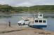 The ferry <I>Belnahua</I> off loading at the Cuan Slipway on the Isle of Seil having crossed the Cuan Sound from the Isle of Luing, whose slipway can also be seen across the channel. The <I>Belnahua</I>, named after a local slate island, was built at Campbeltown Shipyard in 1972. <br><br>[Mark Bartlett 24/07/2016]