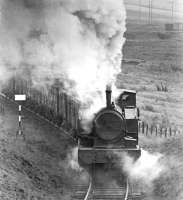 NCB West Ayr Area no 24 (AB 2335/1953) approaching Dunaskin in March 1972 with coal from Pennyvenie destined for the washery.<br><br>[John Furnevel 04/03/1972]