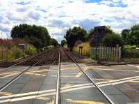 A quick grabshot taken while walking (briskly) across the line at Cornton on 1st August 2016. Before the railway through Stirling is electrified in 2019, Network Rail plans to close the existing vehicle and foot crossings at Cornton and replace them with a road bridge with pedestrian and cycle access. <br><br>[Colin McDonald 01/08/2016]