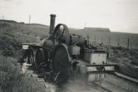 Old locomotive at Longmorn Distillery in 1951. This was in the siding at the north end of the station, the 'main line' being seen just to the right. The 2-2-0 at the buffer is McLaren no. 614 of 1898, recorded as scrapped in 1949.<br><br>[Alec Unsworth (Courtesy Chris Unsworth) //1951]