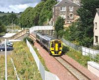 ScotRail 158739 about to pass under Low Buckholmside footbridge on 4 August 2016 shortly after leaving Galashiels for the north with the 1159 ex-Tweedbank.<br><br>[John Furnevel 04/08/2016]