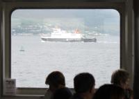 Calmac <I>MV Argyle</I>, making its way from Wemyss Bay to Rothesay, as seen from the lounge of sister ship <I>MV Bute</I>, crossing the Firth of Clyde in the opposite direction on 25th July 2016.  <br><br>[Mark Bartlett 25/07/2016]