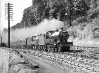 A pair of LMS 4-4-0s double heading the up <I>Mid-Day Scot</I> through Galashiels in the 1930s. The diversion had resulted from an accident on the West Coast Main Line near Carstairs.<br><br>[Dougie Squance (Courtesy Bruce McCartney) //]