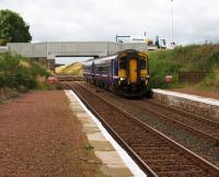 A very <I>short</I> encounter with 156449 passing through the station at speed. In the background is the replacement A706 Road Bridge which was due to open later that day.<br><br>[Colin McDonald 31/08/2016]